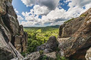 Panoramic view from high rocks in the Carpathian mountains, Tustan fortress. photo