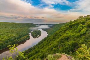 View of the Dniester Canyon from the top with beautiful clouds photo
