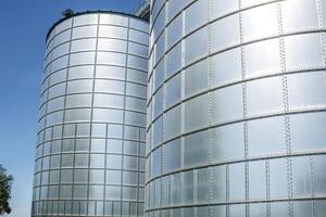 silos granary elevator on agro-industrial complex with seed cleaning and drying line for grain storage photo