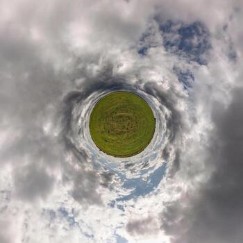 simple tiny planet without buildings in blue sky with beautiful clouds. Transformation of spherical panorama 360 degrees. Spherical abstract aerial view. Curvature of space. photo