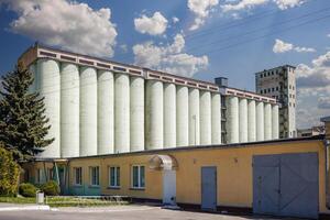 silos granary elevator on agro-industrial complex with seed cleaning and drying line for grain storage photo