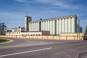 silos granary elevator on agro-industrial complex with seed cleaning and drying line for grain storage photo