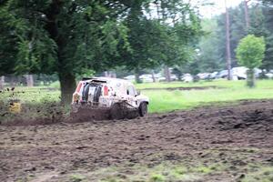 Malpas in Cheshire in the UK in September 2020. A view of a Landrover going through the mud in a field photo