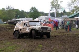 Malpas in Cheshire in the UK in September 2020. A view of a Landrover going through the mud in a field photo