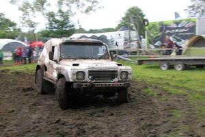Malpas in Cheshire in the UK in September 2020. A view of a Landrover going through the mud in a field photo