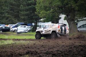 Malpas in Cheshire in the UK in September 2020. A view of a Landrover going through the mud in a field photo