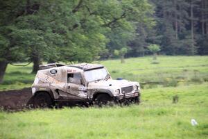 Malpas in Cheshire in the UK in September 2020. A view of a Landrover going through the mud in a field photo