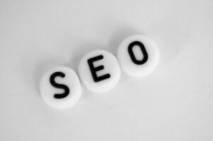 Top view of SEO text representing search engine optimization photo