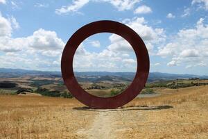 A view of a Ring in a field in Italy photo