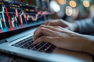 A financial analyst works with real-time stock data on a multi-monitor computer. photo