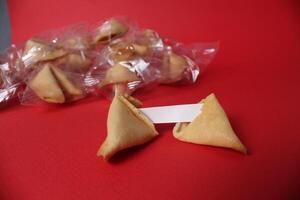 Cookie prediction text on a red background. New Year's Eve Copyspace Traditions photo