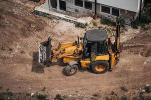 A tractor on the construction site of a school Lviv Ukraine 20.05.24 photo