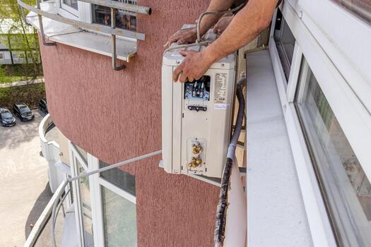 Installing an air conditioner in an apartment office Lviv Ukraine 08.04.2024 photo
