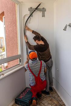Installing an air conditioner in an apartment office Lviv Ukraine 08.04.2024 photo
