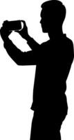 a man taking picture with mobile phone black color silhouette, white background vector