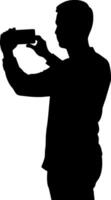 a man taking picture with mobile phone black color silhouette, white background vector
