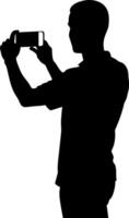 a man taking picture with mobile phone black color silhouette, white background vector