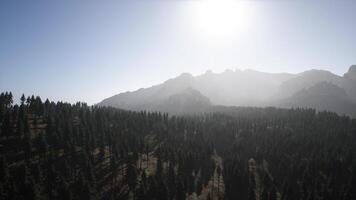 The sun is shining over a mountain range video