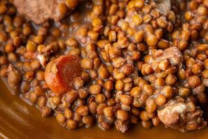 lentils with meat beef or pork fresh cooking appetizer meal food snack on the table copy space food background rustic photo