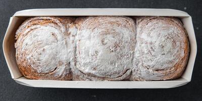 bun brioche sweet puff pastry dessert fresh cooking meal food snack on the table copy space food background rustic top view photo