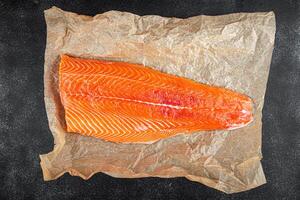 salmon fillet raw red fish seafood appetizer meal food snack on the table copy space food background rustic top view vegetarian food no met Pescetarian photo