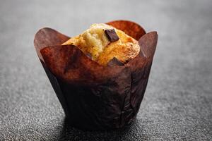 chocolate cupcake sweet dessert cake appetizer meal food snack on the table copy space food background rustic top view photo