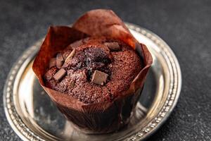 muffin chocolate sweet dessert cake appetizer meal food snack on the table copy space food background rustic top view photo