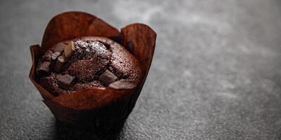 muffin chocolate sweet dessert cake appetizer meal food snack on the table copy space food background rustic top view photo