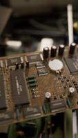 old computer floppy disk and motherboard video