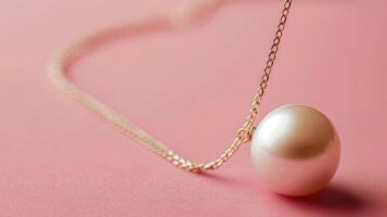 Elegant single pearl necklace on a serene blush pink background, ideal for creative copyspace photo