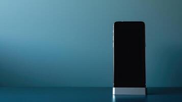 Minimalist smartphone stand on a powder blue background with ample copyspace for creative projects photo