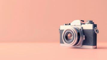 Artistic vintage camera on a peach background with generous copyspace photo