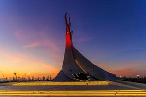 Tashkent, Uzbekistan - April 19, 2023 Memorial of Freedom and Independence in the form of a pyramid with a structure of national color on the square of the city park New Uzbekistan- Yangi Uzbekistan photo