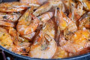 Grilled shrimps with garlic rosemary and spices photo