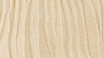 Natural wavy sand texture background. pattern on a beach photo