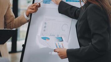 Team of business people are meeting to analyze data for marketing plan,Market research reports and income statistics, Financial and Accounting concept. video