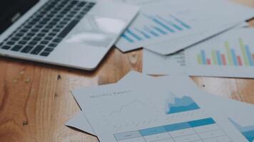 Team of business people are meeting to analyze data for marketing plan,Market research reports and income statistics, Financial and Accounting concept. video