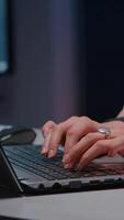 Close-up of businesswoman hands on keyboard sitting at desk in startup company office planning economic project on internet. Executive manager typing financial statistics answering business email video