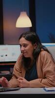 Happy cheerful businesswoman smiling while looking at laptop computer display receving winning corporate job promotion. newa Joyful happy executive manager working in company office late at night video