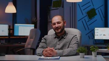 Pov of businessman explaining marketing project during company webinar videocall teleconference meeting conference in startup office. Manager man having business job telework interview late at night video
