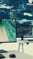 Vertical Military control center used in following global threats on a big display, empty federal intelligence agency deals with national safety alerts. Government service operations room with high tech. video