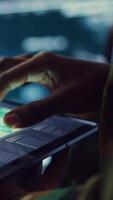 Vertical Navy operations specialist examines a world map with gps system on his tablet, working on finding tracks of enemy vessels. General employs government satellite data for missions. Close up. Camera B. video