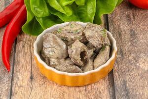 Chicken liver with cream sauce photo