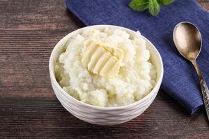 Homemade rice porridge with butter photo