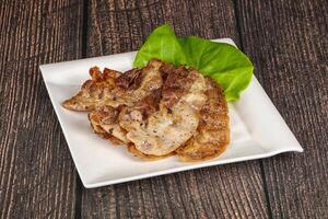 Roasted sliced pork fat bacon photo