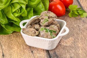 Chicken liver with cream sauce photo