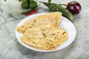 Indian tandori bread - naan with cheese photo