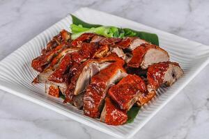 Asian cuisine - roasted duck with skin photo