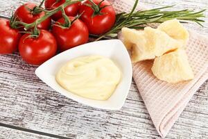 Cheese sauce in the bowl photo