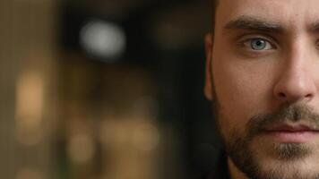 Close up macro view in details half part face Caucasian strong man businessman guy looking to camera head shot male eyesight eyes vision ophthalmology laser correction health medical empty copy space photo